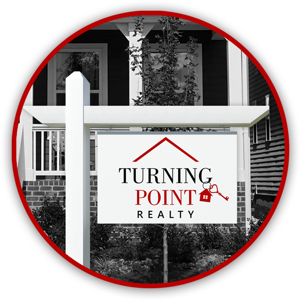 turning point realty sign in front of house
